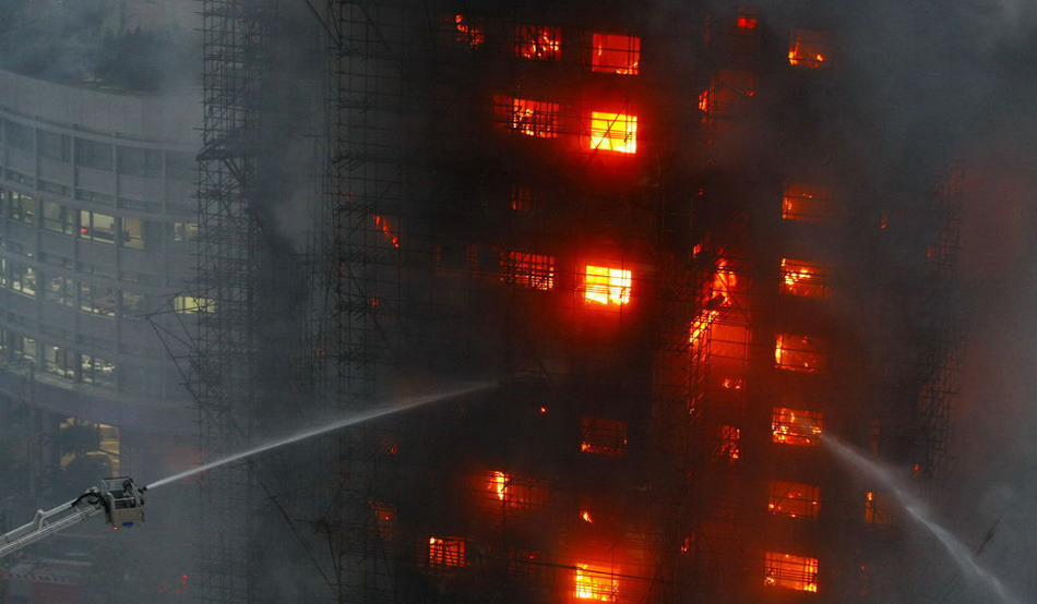 上海胶州路教师公寓大火已致49人遇难_人在他